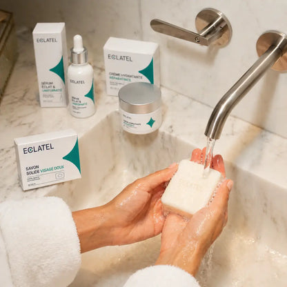 ECLATEL skincare routine with soap serum and cream on bathroom sink